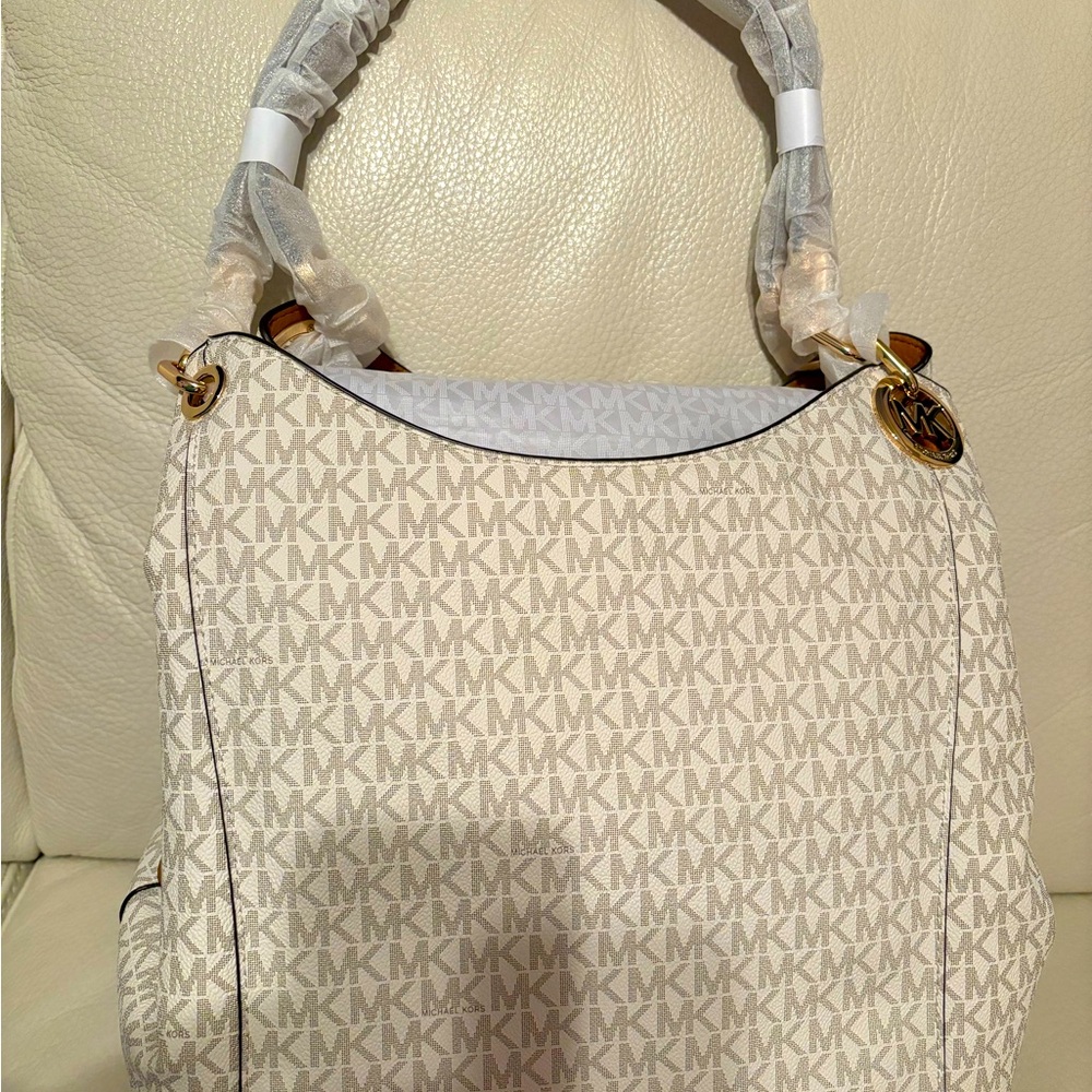 Michael Kors Fulton handbag. Large charm shoulder tote.  Vanilla.